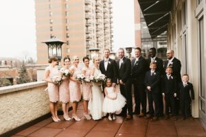 bridal party in pastel pink and navy metropolis ballroom chicago