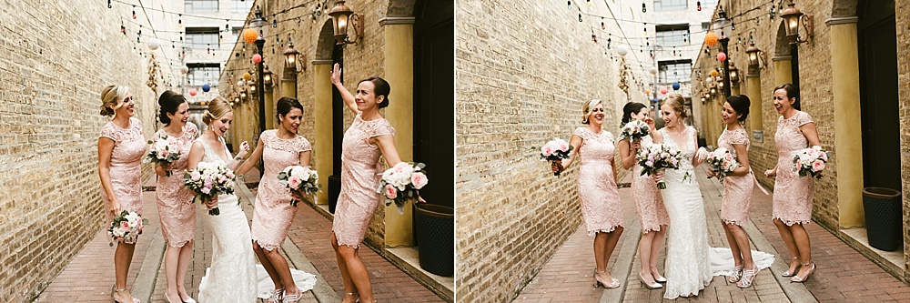 bridesmaids and bride dancing in alleyway metropolis ballroom chicago wedding
