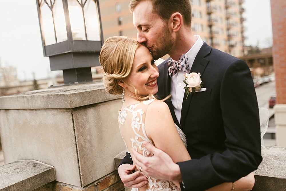 bride and groom on metropolis ballroom balcony chicago