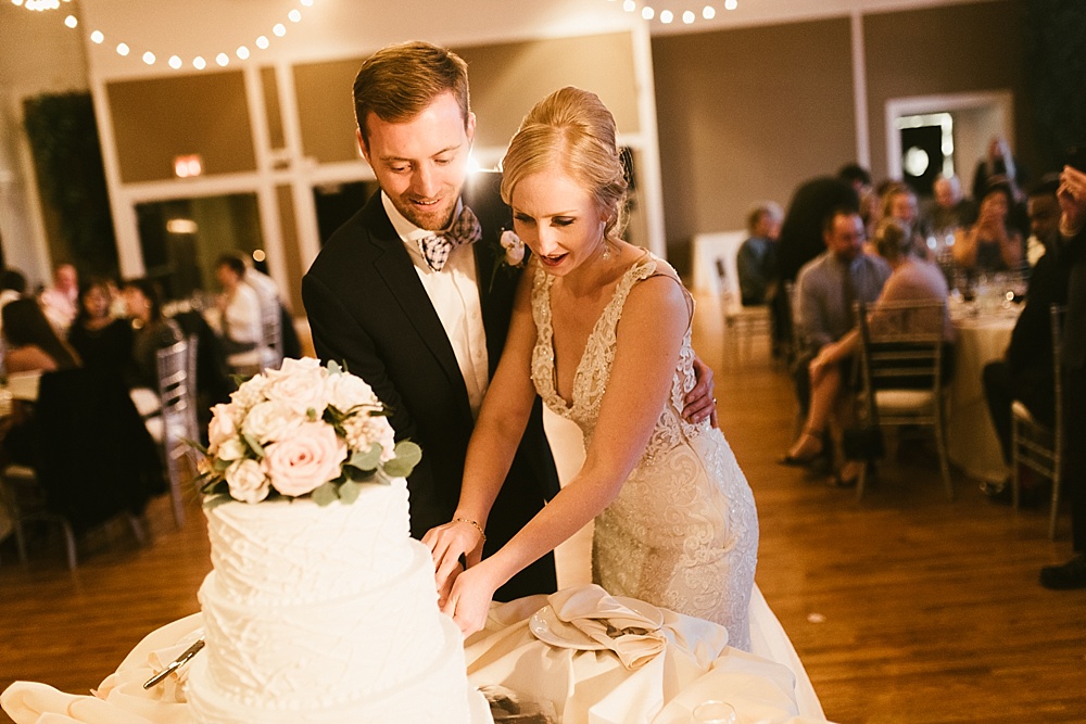 bride and groom cutting cake metropolis ballroom chicago