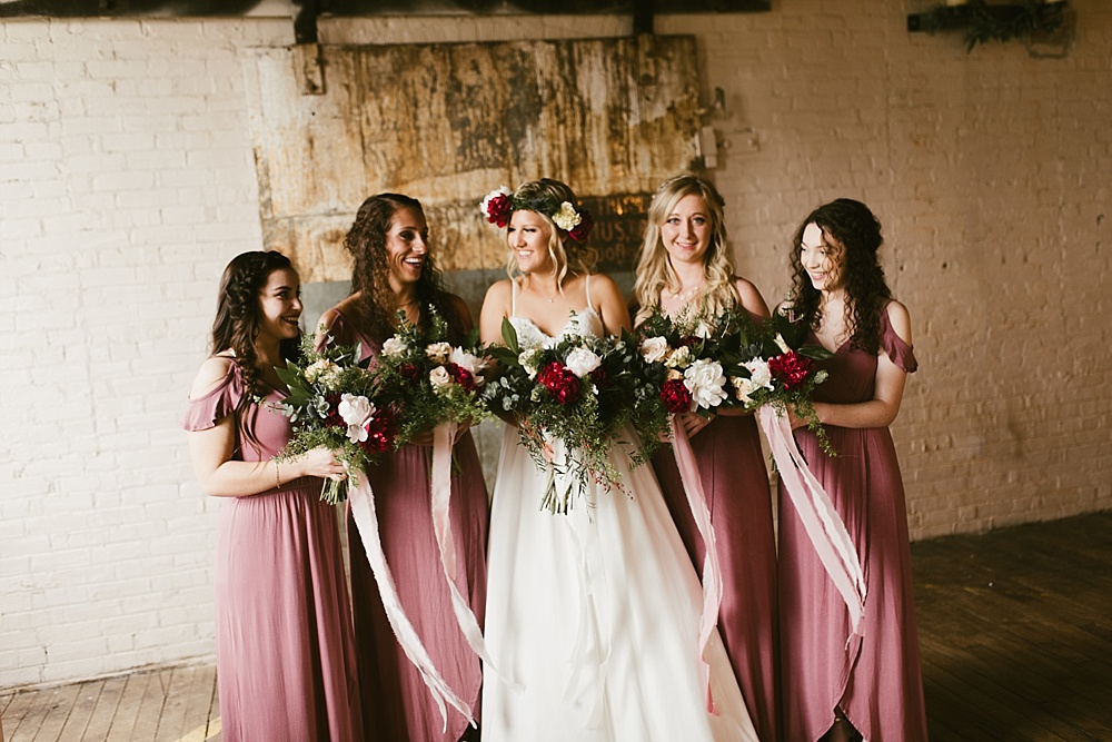 boho bridesmaids in blush tones with peonies at coppes commons indiana