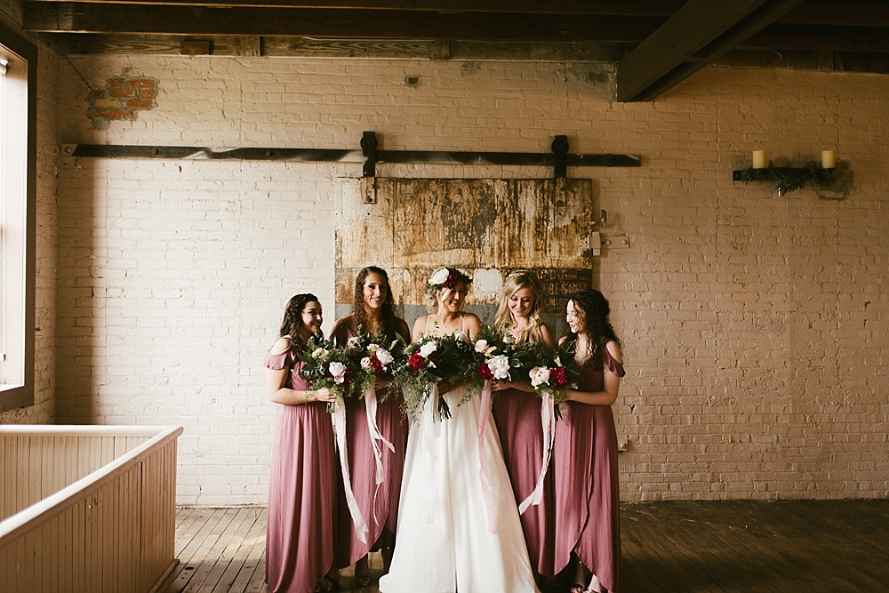 boho bridesmaids in blush tones with peonies at coppes commons indiana