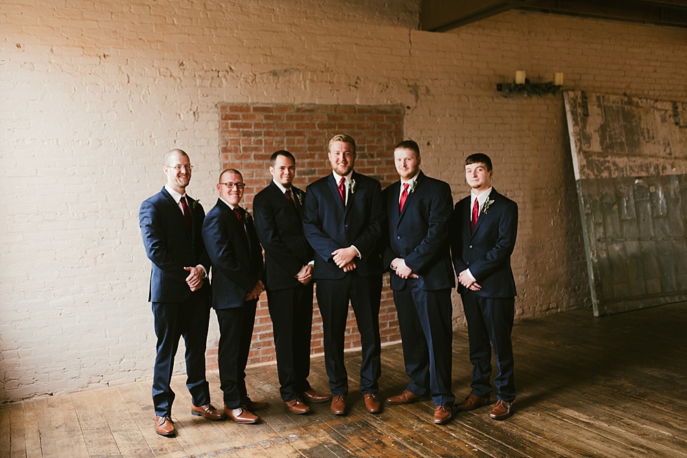 groomsmen in navy suits at coppes commons indiana