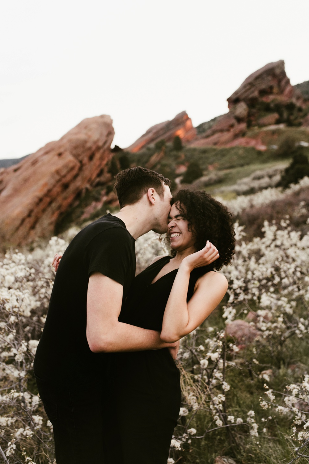 couple in flower patch at red rock ampitheatre
