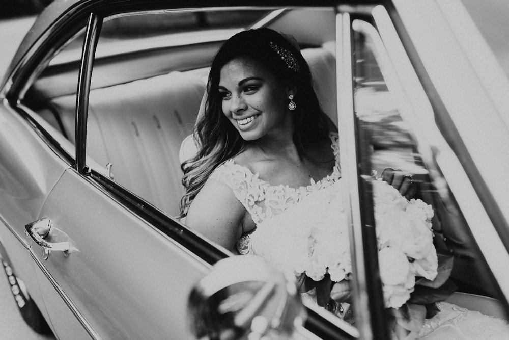 bride in vintage impala passenger seat