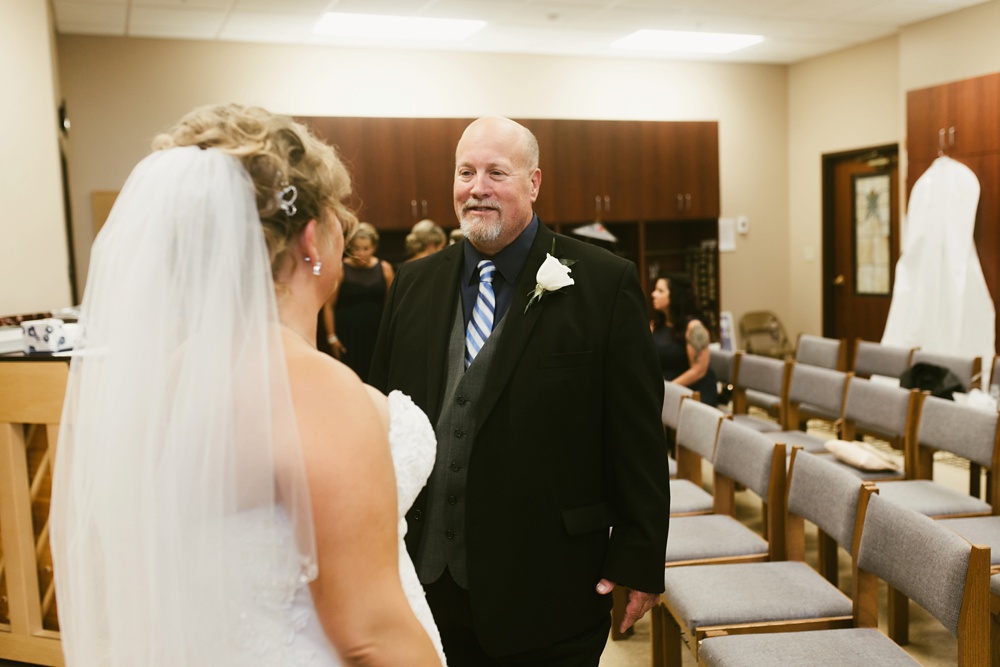 bride and father of the bride at st. anthony's catholic church