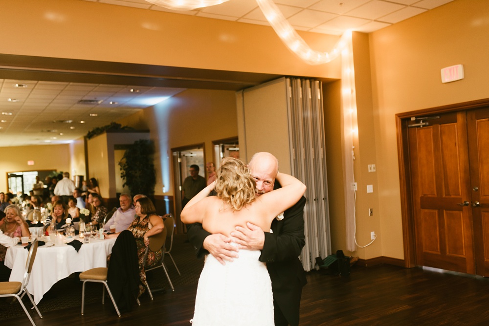 father daughter hugging during dance at glendarin golf course wedding