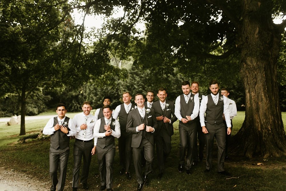 groomsmen and groom at j weaver barn wedding