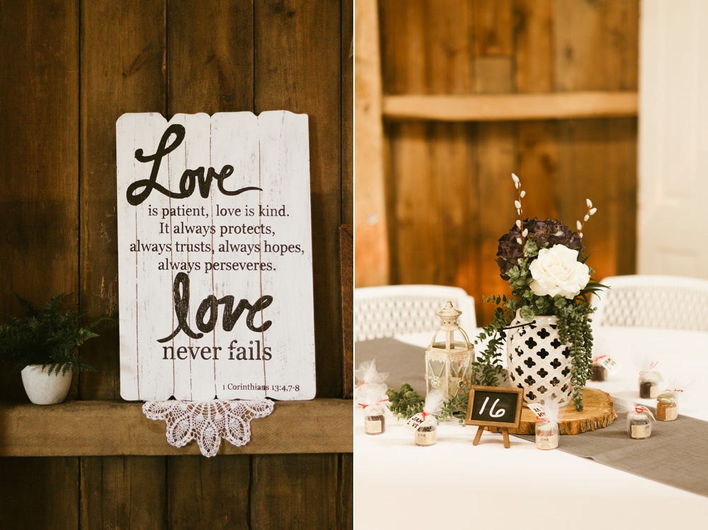 love is patient love is kind sign and table decor at j weaver barn wedding