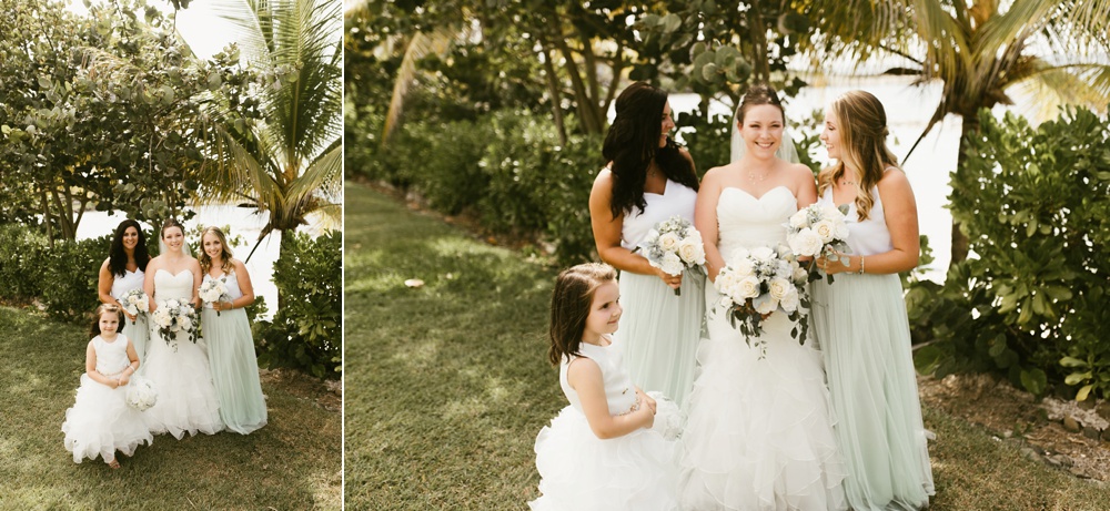 bridal party in tulle skirts and express tops and flower girl at grand palladium jamaica wedding