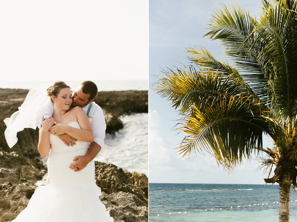 groom kissing bride oceanside and palm tree at grand palladium jamaica wedding