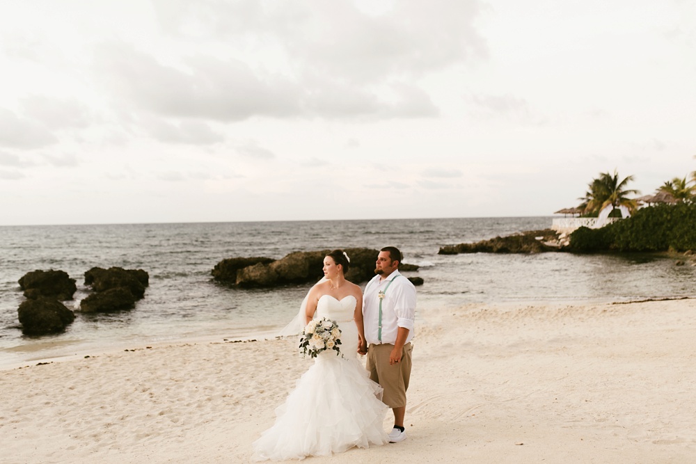 bride and groom on beach at grand palladium jamaica wedding
