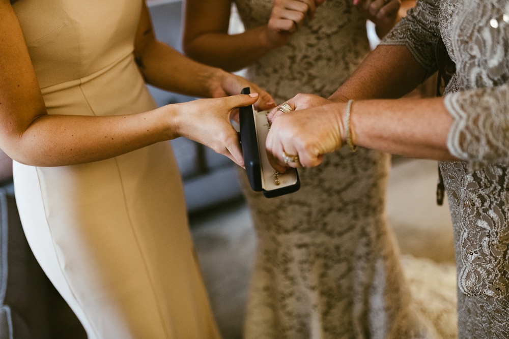mother of bride and bridesmaid with brides bracelet at pine valley country club wedding