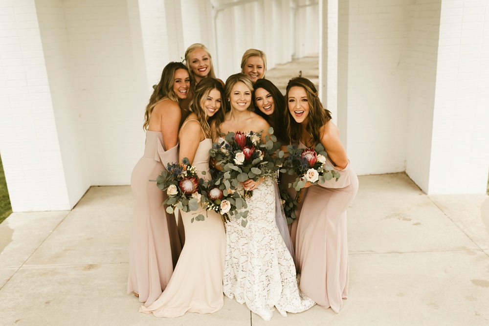 bridesmaids in blush dresses and bride at pine valley country club wedding