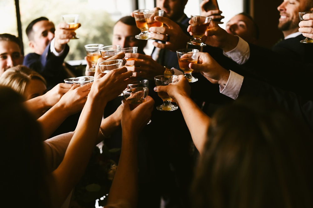 wedding party cheersing at pine valley country club wedding