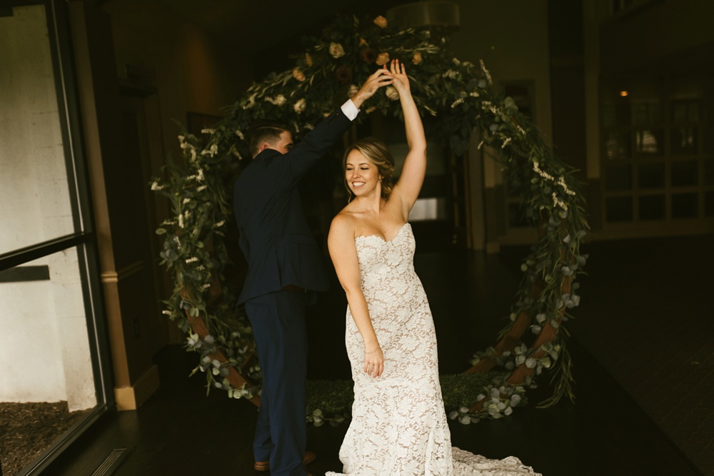 groom twirling bride at pine valley country club wedding