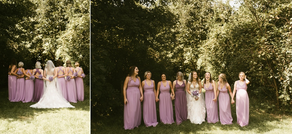 bridesmaids in purple dresses and bride at metea county park fall wedding