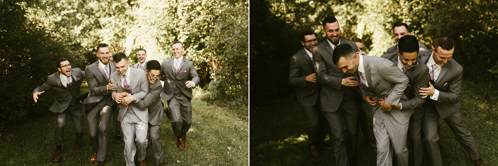 groomsmen and groom wrestling at metea county park fall wedding