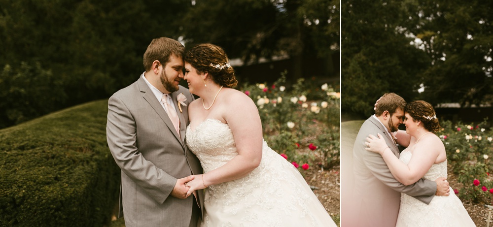 couple hugging among flowers at foster park wedding photos