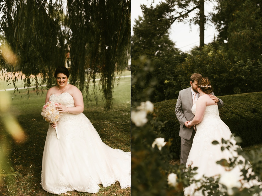 couple kissing under willow tree at foster park wedding photos
