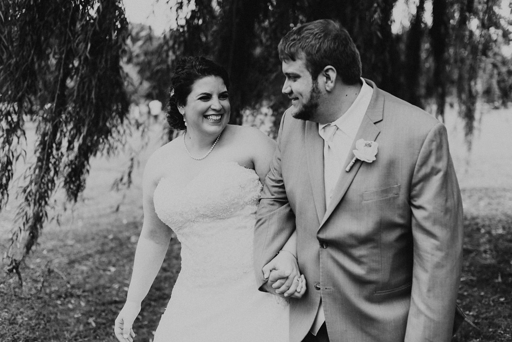 bride and groom laughing at foster park wedding