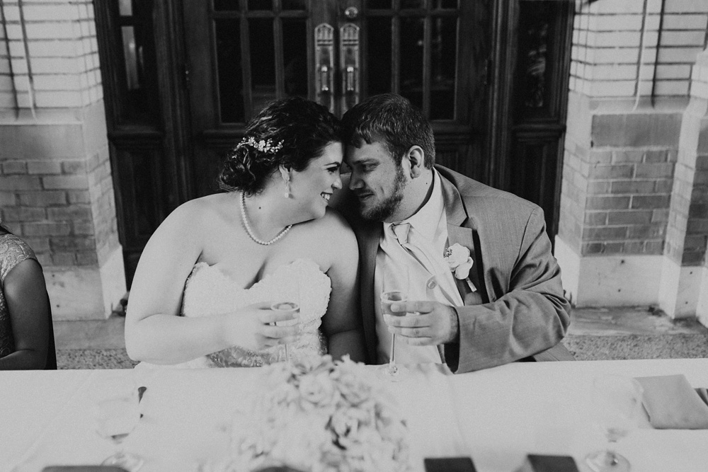 couple smiling at baker street train station wedding