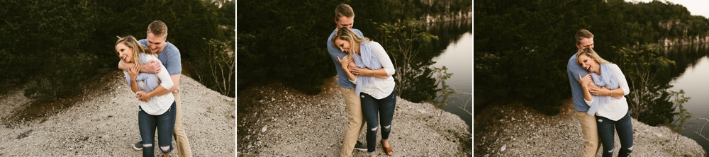 couple hugging by water at france park engagement session