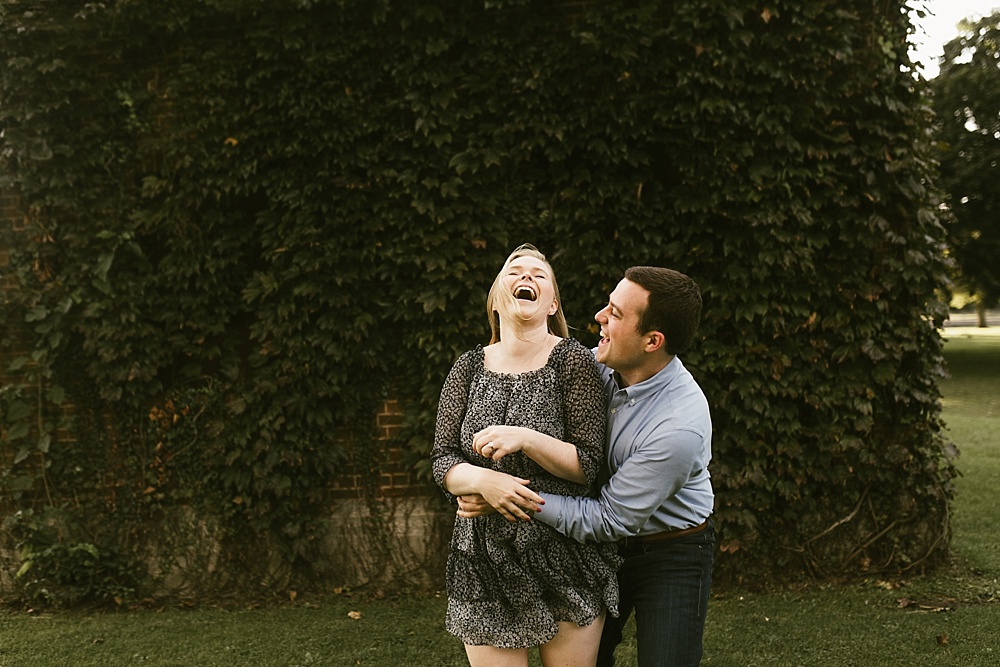 couple laughing at downtown south bend engagement session
