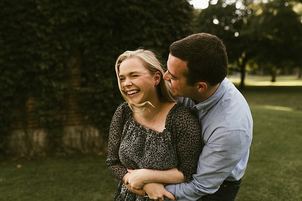 couple hugging at downtown south bend engagement session