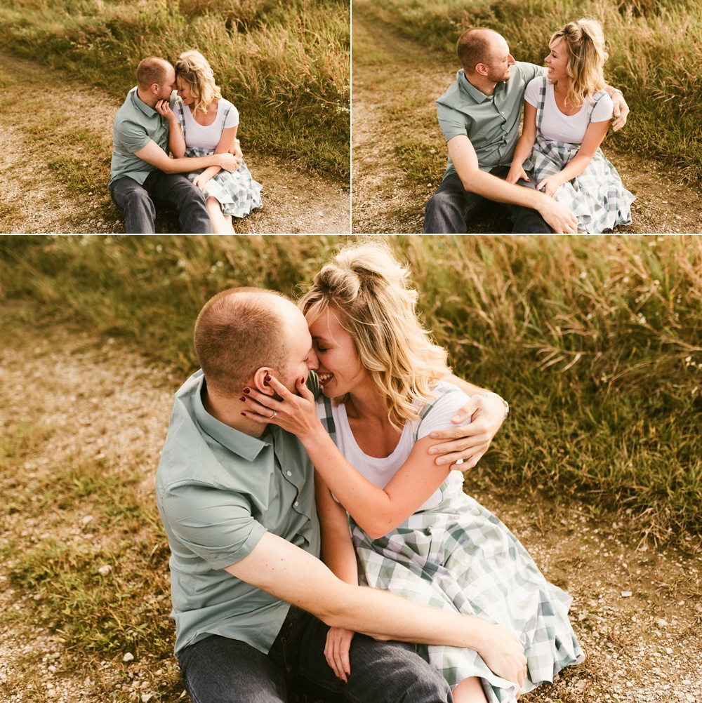 couple laughing by field at eagle marsh nature preserve engagement session