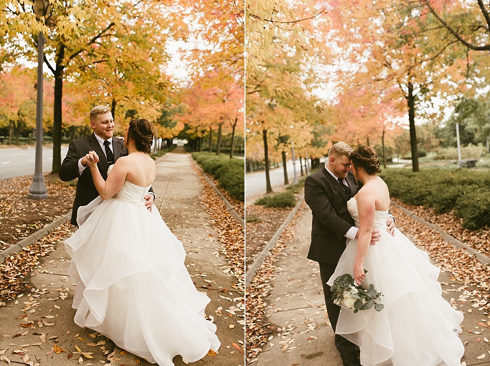 bride and groom dancing at headwaters park fall wedding