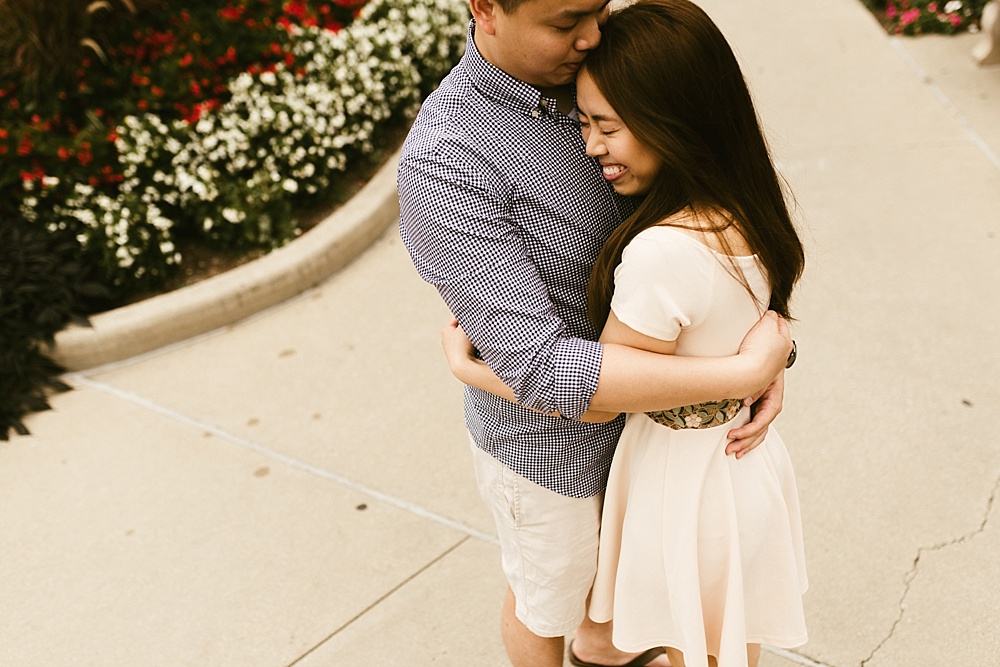 couple hugging on bloomington campus at indiana university bloomington engagement session