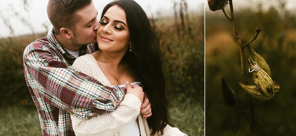 couple smiling and kissing next to field at sunrise eagle marsh engagement session