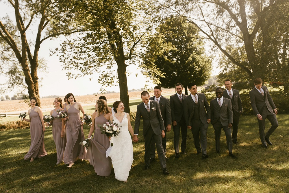 wedding party in gray tuxes and rose dresses at indiana wesleyan fairmount campground wedding