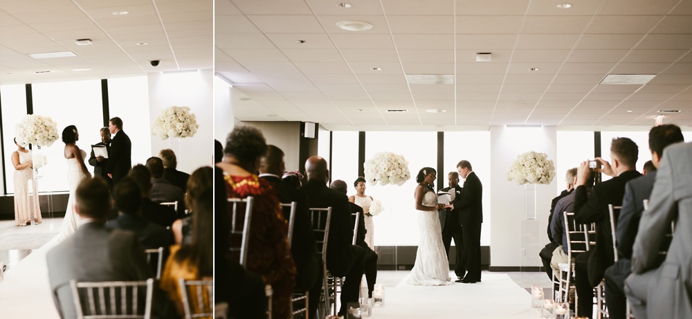 bride and groom exchanging vows at skydeck willis tower wedding