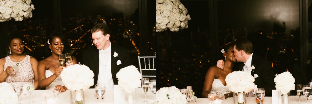Chicago bride and groom at reception table.