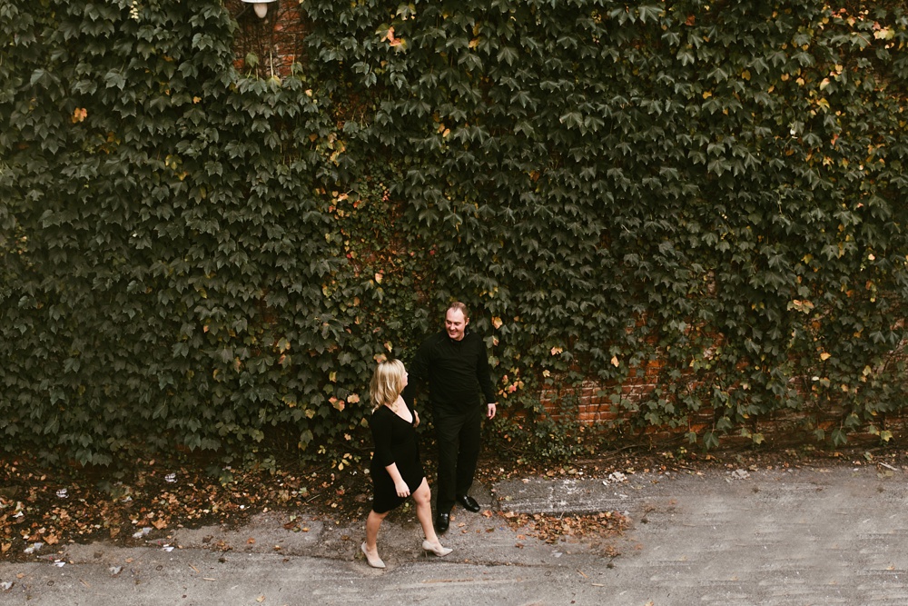 couple holding hands at downtown fort wayne engagement session