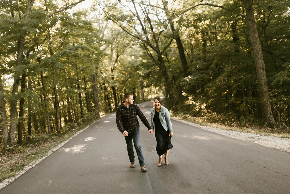 couple holding hands at brown county engagement session