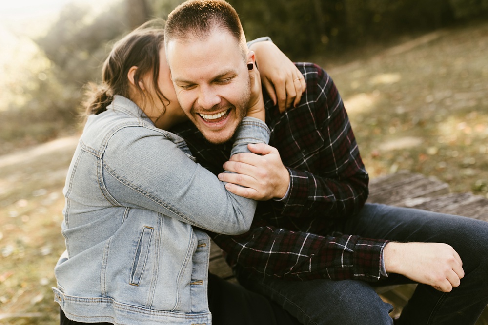 couple laughing at brown county engagement session