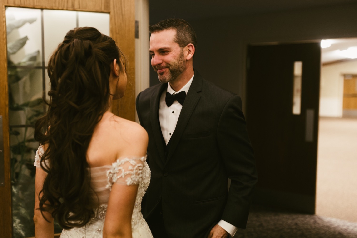 bride and father smiling at fort wayne winter wedding