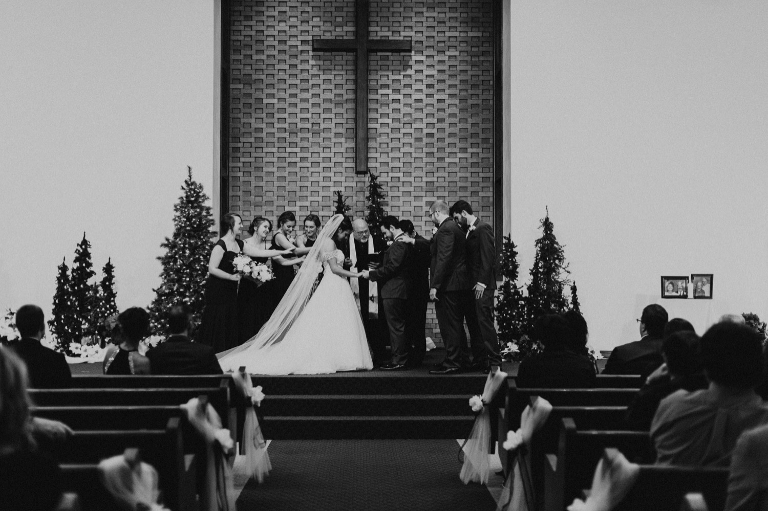 bride and groom during ceremony at zanesville united methodist church at fort wayne winter wedding