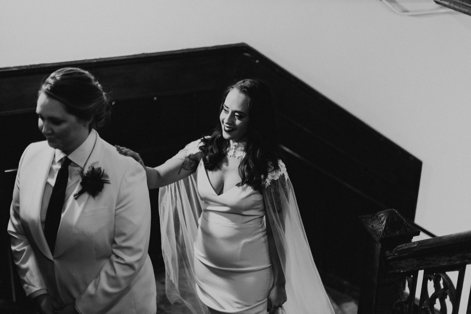 Black and white photo of Chicago bride and bride first look.