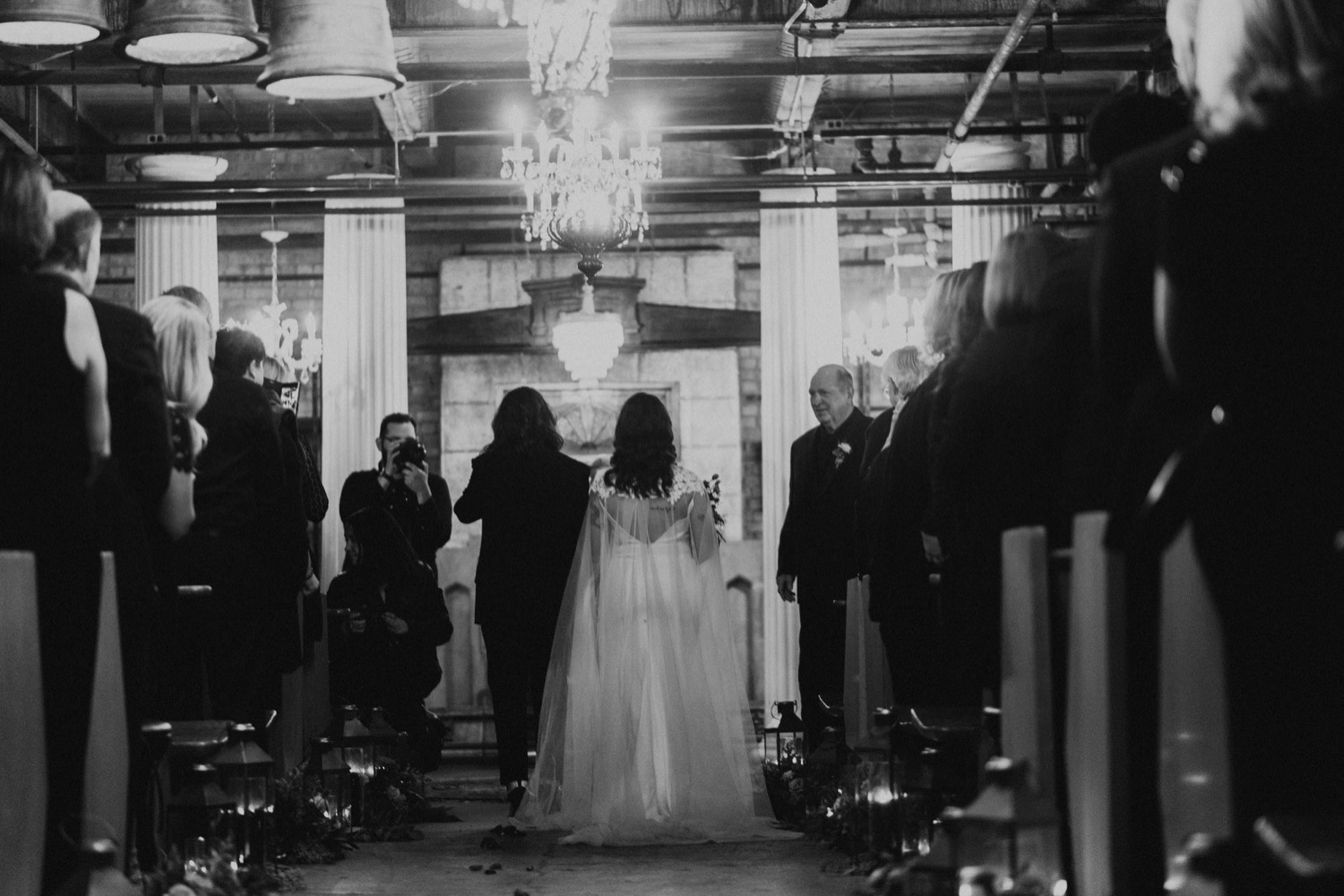 Black and white photo of Chicago bride walking down the aisle.