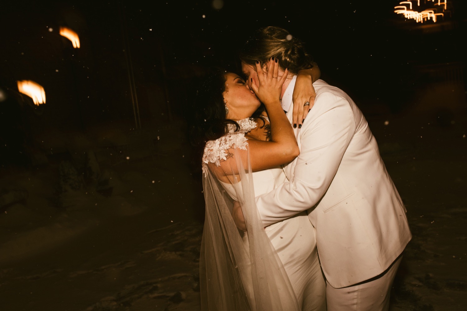 Chicago wedding reception snowy night - couple dancing and hugging.