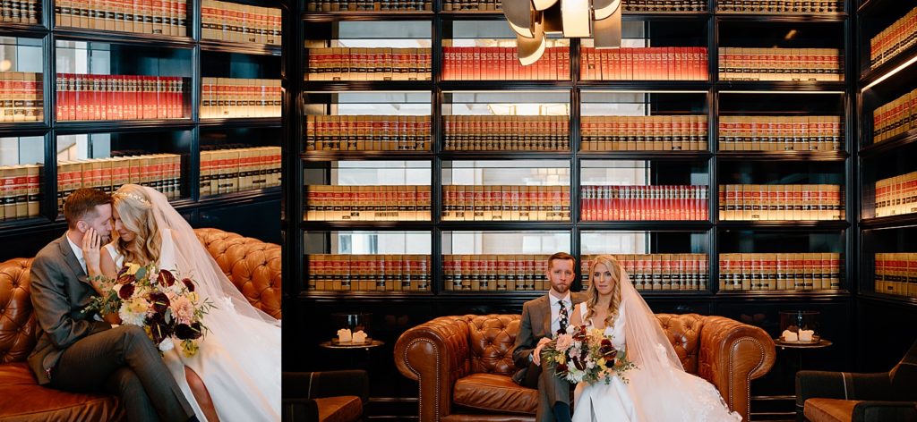 Bride and groom sitting on leather sofa in a library for their boho wedding 