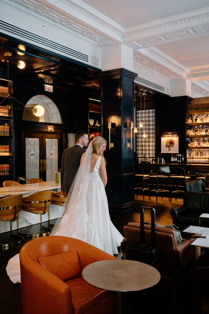 Wedding couple walking through the library by midwest photographer Indigo lace 
