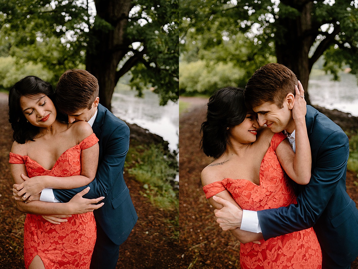 couple caress each other during sweet mortem arboretum engagement session
