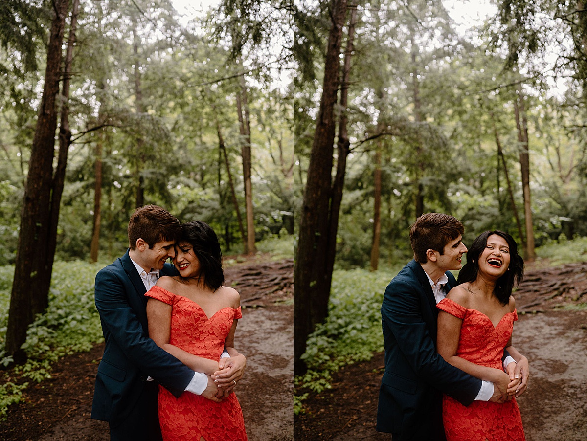 couple laughs during elegant outdoor mortem arboretum engagement session