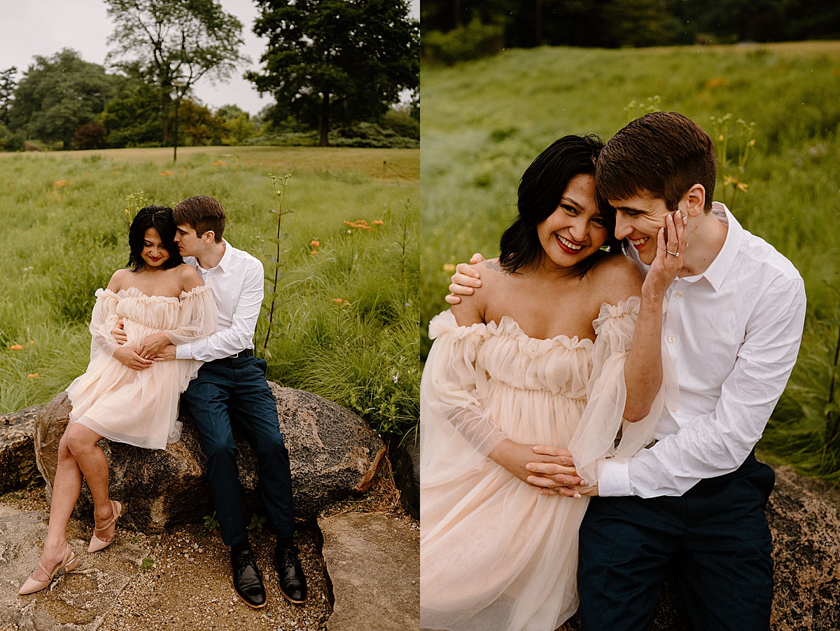 woman in romantic chiffon dress poses with fiance during engagement shoot by Indigo Lace Collective