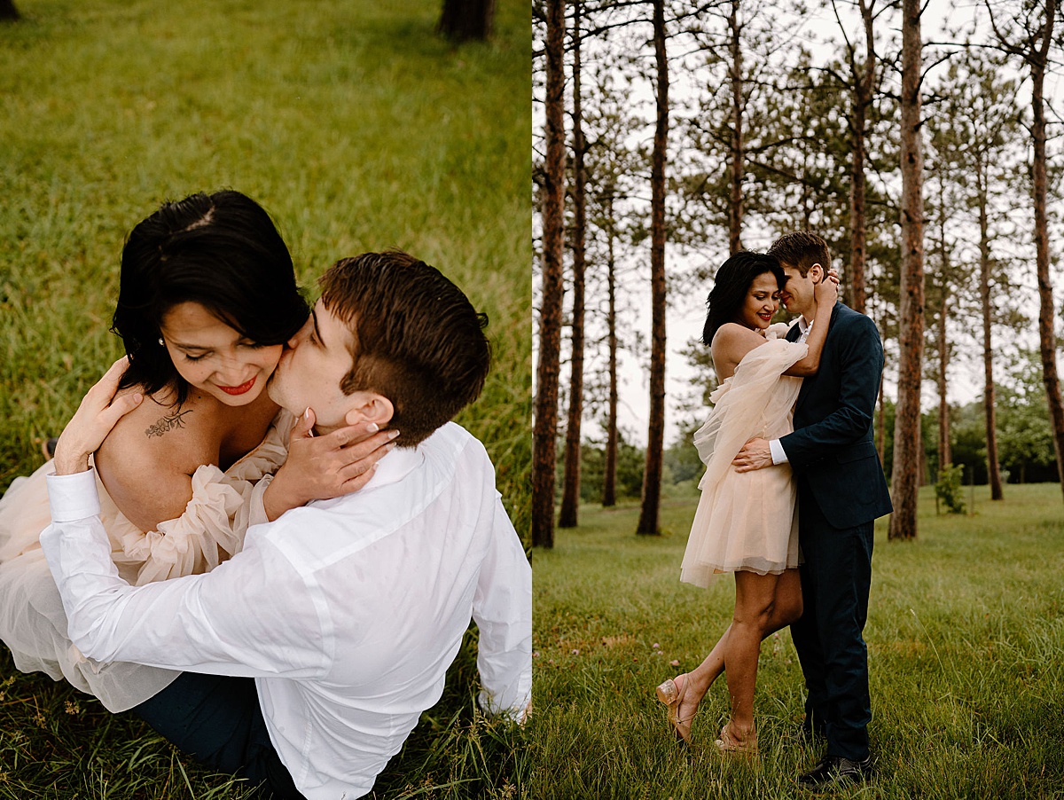 couple poses in woodland glade during sweet engagement shoot by midwest wedding photographer